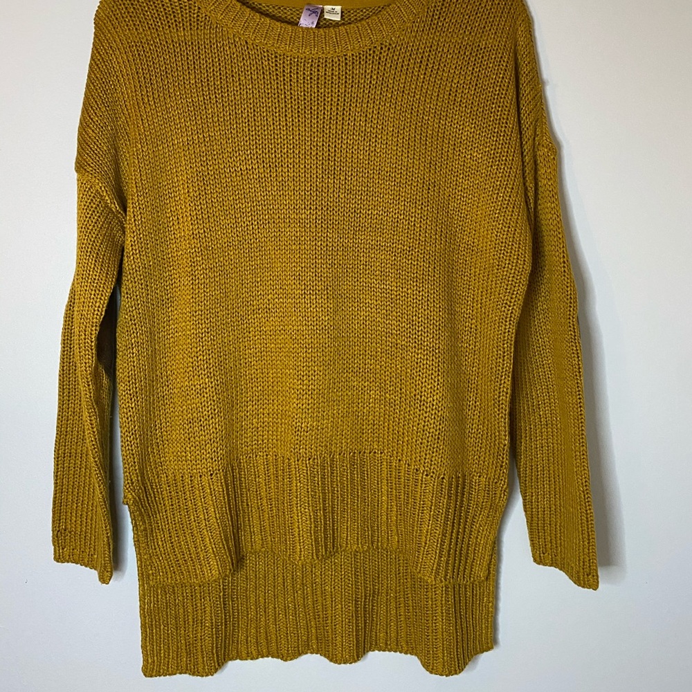 Sweater with elbow patches